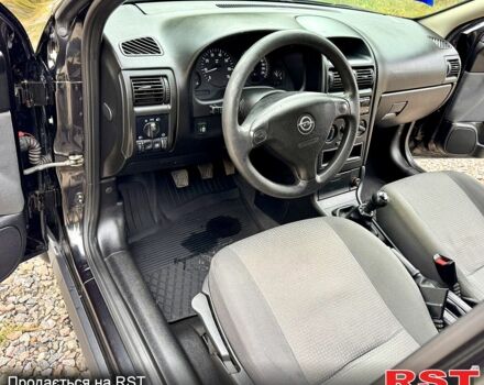 Черный Опель Астра, объемом двигателя 1.4 л и пробегом 176 тыс. км за 4390 $, фото 5 на Automoto.ua