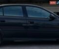 Черный Опель Астра, объемом двигателя 1.4 л и пробегом 270 тыс. км за 3000 $, фото 7 на Automoto.ua
