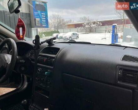 Чорний Опель Астра, об'ємом двигуна 1.39 л та пробігом 170 тис. км за 5100 $, фото 6 на Automoto.ua