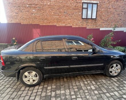 Черный Опель Астра, объемом двигателя 1.6 л и пробегом 151 тыс. км за 3700 $, фото 6 на Automoto.ua