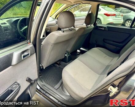 Черный Опель Астра, объемом двигателя 1.4 л и пробегом 176 тыс. км за 4390 $, фото 6 на Automoto.ua