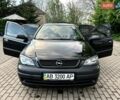 Черный Опель Астра, объемом двигателя 1.6 л и пробегом 154 тыс. км за 4200 $, фото 1 на Automoto.ua
