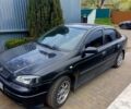 Черный Опель Астра, объемом двигателя 1.6 л и пробегом 285 тыс. км за 3600 $, фото 1 на Automoto.ua