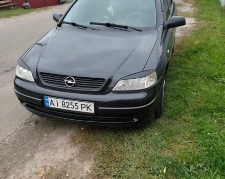 Черный Опель Астра, объемом двигателя 1.39 л и пробегом 166 тыс. км за 4600 $, фото 7 на Automoto.ua