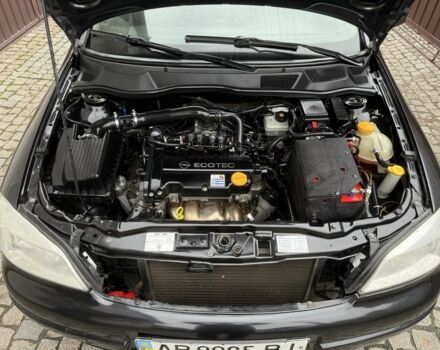 Черный Опель Астра, объемом двигателя 1.4 л и пробегом 160 тыс. км за 4000 $, фото 18 на Automoto.ua