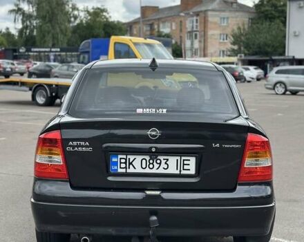 Черный Опель Астра, объемом двигателя 1.4 л и пробегом 277 тыс. км за 3300 $, фото 4 на Automoto.ua