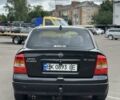 Черный Опель Астра, объемом двигателя 1.4 л и пробегом 277 тыс. км за 3300 $, фото 4 на Automoto.ua