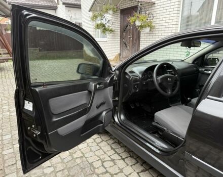 Черный Опель Астра, объемом двигателя 1.4 л и пробегом 160 тыс. км за 4000 $, фото 6 на Automoto.ua
