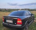 Черный Опель Астра, объемом двигателя 1.4 л и пробегом 140 тыс. км за 3300 $, фото 4 на Automoto.ua