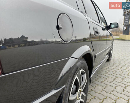 Чорний Опель Астра, об'ємом двигуна 1.36 л та пробігом 198 тис. км за 3950 $, фото 7 на Automoto.ua