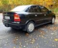 Черный Опель Астра, объемом двигателя 1.4 л и пробегом 265 тыс. км за 3150 $, фото 1 на Automoto.ua