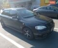 Черный Опель Астра, объемом двигателя 1.4 л и пробегом 230 тыс. км за 3800 $, фото 1 на Automoto.ua