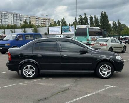 Черный Опель Астра, объемом двигателя 1.4 л и пробегом 277 тыс. км за 3300 $, фото 7 на Automoto.ua