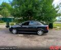 Черный Опель Астра, объемом двигателя 1.6 л и пробегом 137 тыс. км за 4600 $, фото 1 на Automoto.ua