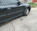 Черный Опель Астра, объемом двигателя 1 л и пробегом 166 тыс. км за 3500 $, фото 7 на Automoto.ua
