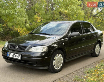 Черный Опель Астра, объемом двигателя 1.4 л и пробегом 250 тыс. км за 3650 $, фото 2 на Automoto.ua