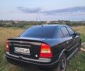 Черный Опель Астра, объемом двигателя 1.4 л и пробегом 140 тыс. км за 3300 $, фото 3 на Automoto.ua