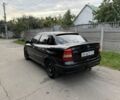 Черный Опель Астра, объемом двигателя 1.4 л и пробегом 240 тыс. км за 1554 $, фото 5 на Automoto.ua