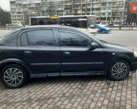 Черный Опель Астра, объемом двигателя 1.6 л и пробегом 277 тыс. км за 3400 $, фото 1 на Automoto.ua