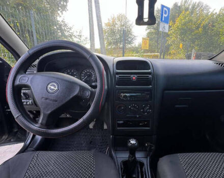 Черный Опель Астра, объемом двигателя 1.4 л и пробегом 290 тыс. км за 2700 $, фото 46 на Automoto.ua