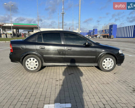 Черный Опель Астра, объемом двигателя 1.36 л и пробегом 178 тыс. км за 4000 $, фото 6 на Automoto.ua