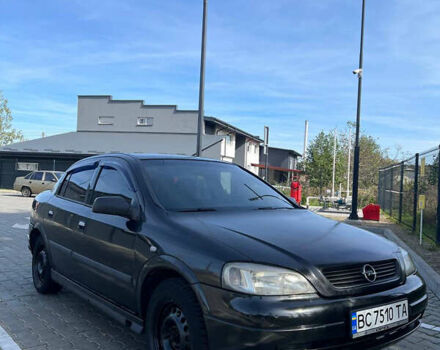 Черный Опель Астра, объемом двигателя 1.4 л и пробегом 290 тыс. км за 2700 $, фото 3 на Automoto.ua