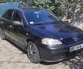 Черный Опель Астра, объемом двигателя 1.39 л и пробегом 143 тыс. км за 4200 $, фото 4 на Automoto.ua