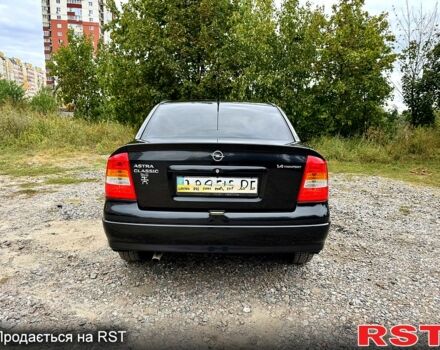 Черный Опель Астра, объемом двигателя 1.4 л и пробегом 176 тыс. км за 4390 $, фото 3 на Automoto.ua