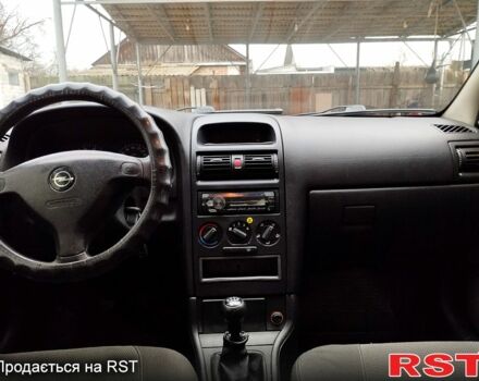 Черный Опель Астра, объемом двигателя 1.4 л и пробегом 250 тыс. км за 3999 $, фото 9 на Automoto.ua