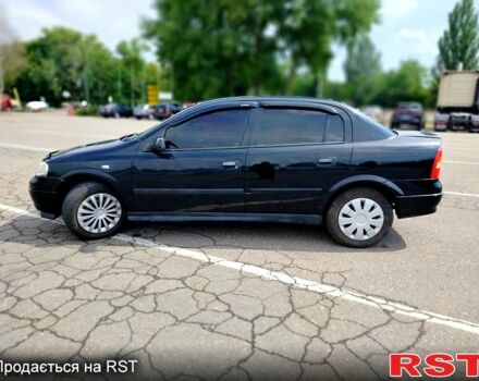 Черный Опель Астра, объемом двигателя 1.4 л и пробегом 320 тыс. км за 3300 $, фото 3 на Automoto.ua