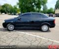 Черный Опель Астра, объемом двигателя 1.4 л и пробегом 320 тыс. км за 3300 $, фото 3 на Automoto.ua