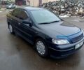 Черный Опель Астра, объемом двигателя 1.4 л и пробегом 260 тыс. км за 3300 $, фото 1 на Automoto.ua