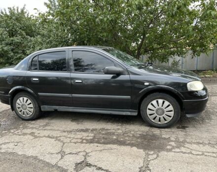 Черный Опель Астра, объемом двигателя 1.4 л и пробегом 1000 тыс. км за 2500 $, фото 3 на Automoto.ua