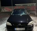 Черный Опель Астра, объемом двигателя 1.4 л и пробегом 338 тыс. км за 2300 $, фото 1 на Automoto.ua