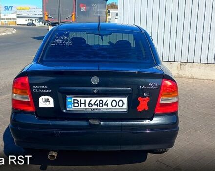Черный Опель Астра, объемом двигателя 1.4 л и пробегом 290 тыс. км за 4300 $, фото 1 на Automoto.ua