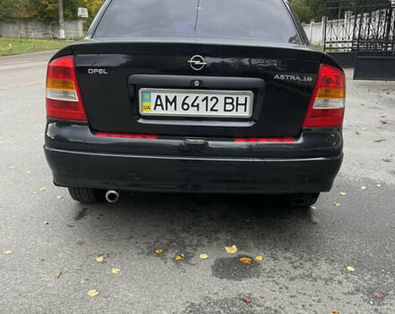 Черный Опель Астра, объемом двигателя 1.6 л и пробегом 150 тыс. км за 3800 $, фото 7 на Automoto.ua