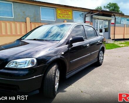 Черный Опель Астра, объемом двигателя 1.6 л и пробегом 217 тыс. км за 4100 $, фото 1 на Automoto.ua