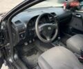 Черный Опель Астра, объемом двигателя 1.4 л и пробегом 270 тыс. км за 3000 $, фото 12 на Automoto.ua