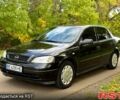 Черный Опель Астра, объемом двигателя 1.4 л и пробегом 250 тыс. км за 4000 $, фото 2 на Automoto.ua