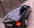 Черный Опель Астра, объемом двигателя 1.4 л и пробегом 160 тыс. км за 3500 $, фото 2 на Automoto.ua