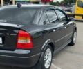 Черный Опель Астра, объемом двигателя 1.4 л и пробегом 272 тыс. км за 3600 $, фото 5 на Automoto.ua