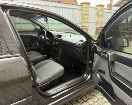 Черный Опель Астра, объемом двигателя 1.4 л и пробегом 160 тыс. км за 4000 $, фото 13 на Automoto.ua