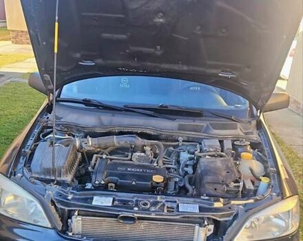 Черный Опель Астра, объемом двигателя 1.4 л и пробегом 160 тыс. км за 4300 $, фото 6 на Automoto.ua