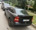 Черный Опель Астра, объемом двигателя 1.6 л и пробегом 300 тыс. км за 2400 $, фото 1 на Automoto.ua
