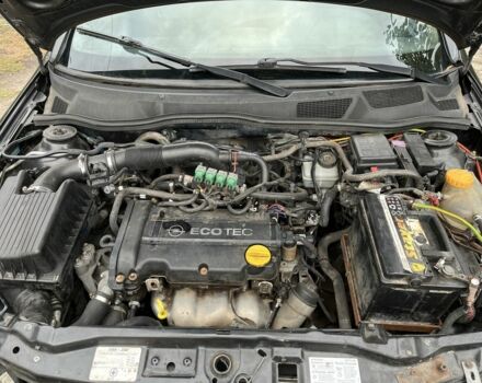 Черный Опель Астра, объемом двигателя 1.4 л и пробегом 1000 тыс. км за 2500 $, фото 6 на Automoto.ua