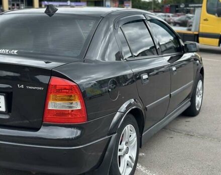 Черный Опель Астра, объемом двигателя 1.4 л и пробегом 277 тыс. км за 3300 $, фото 6 на Automoto.ua