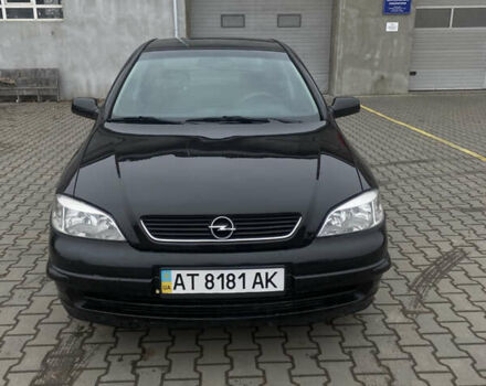 Черный Опель Астра, объемом двигателя 1.4 л и пробегом 229 тыс. км за 3200 $, фото 1 на Automoto.ua