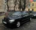 Черный Опель Астра, объемом двигателя 1.6 л и пробегом 250 тыс. км за 2000 $, фото 1 на Automoto.ua