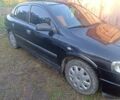Черный Опель Астра, объемом двигателя 1.4 л и пробегом 135 тыс. км за 4200 $, фото 4 на Automoto.ua