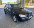 Черный Опель Астра, объемом двигателя 1.4 л и пробегом 107 тыс. км за 4800 $, фото 2 на Automoto.ua